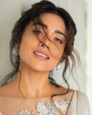 Scenic Actress Shriya Saran in a Pink Halterneck Bikini and Blue Floral Tropical Sarong Photos 03