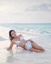 Seductive Shriya Saran in a Silver Triangle Bikini Top with Matching High Waisted Bikini Bottoms Photos 02