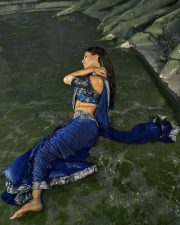 Sexy Beauty Nabha Natesh in a Deep Blue Saree with a Shimmering Silver Border Photos 01