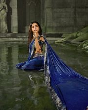 Sexy Beauty Nabha Natesh in a Deep Blue Saree with a Shimmering Silver Border Photos 02