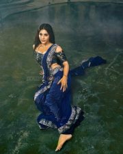Sexy Beauty Nabha Natesh in a Deep Blue Saree with a Shimmering Silver Border Photos 06