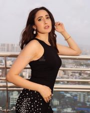 Sexy Pragya Jaiswal in a Black Sleeveless Dress with Pearl Stitched Skirt Pictures 01