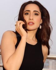 Sexy Pragya Jaiswal in a Black Sleeveless Dress with Pearl Stitched Skirt Pictures 04