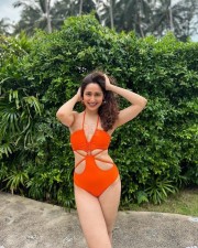 Sexy Pragya Jaiswal in a Red Holiday Bikini Photos 04