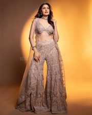 Sexy Pragya Jaiswal in a Shimmering Cream Bralette with a Palazzo and Shrug Photos 04