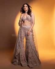 Sexy Pragya Jaiswal in a Shimmering Cream Bralette with a Palazzo and Shrug Photos 05