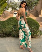 Sexy Pragya Jaiswal in an Emerald Green Satin Wrap Backless Dress Pictures 04