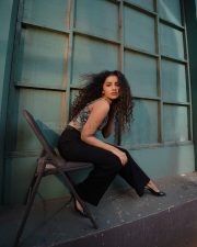 Sexy Stylish Anupama Parameswaran in a Floral Corset Top and Black Pants Photos 01