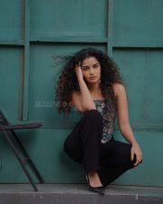 Sexy Stylish Anupama Parameswaran in a Floral Corset Top and Black Pants Photos 02