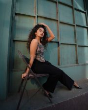 Sexy Stylish Anupama Parameswaran in a Floral Corset Top and Black Pants Photos 08