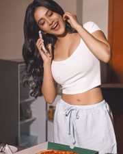 Sexy and Playful Nabha Natesh in a White Crop Top and Lounge Shorts Photos 07