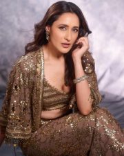 Shimmering Pragya Jaiswal in a Golden Bronze Bustier Crop Top with a High Waisted Wide Leg Palazzo Pants and Cape Jacket Photos 05