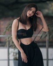 Sizzling Vedhika in Black Strapless Bra and Jumpsuit Photos 04