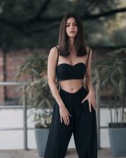 Sizzling Vedhika in Black Strapless Bra and Jumpsuit Photos 05