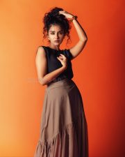 South Indian Actress Anupama Parameswaran in a Black Sleeveless Top and a Light Brown Ruffled Maxi Skirt Photos 07 South Indian Actress Anupama Parameswaran in a Black Sleeveless Top and a Light Brown Ruffled Maxi Skirt Photos 07
