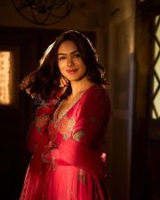 Stunning Beautiful Mrunal Thakur in a Pink Floral Print Anarkali Dress Photos 09
