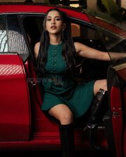 Stunning Nabha Natesh in a Dark Green Mini Dress with Long Boots Photos 02