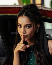 Stunning Nabha Natesh in a Dark Green Mini Dress with Long Boots Photos 03