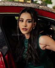 Stunning Nabha Natesh in a Dark Green Mini Dress with Long Boots Photos 06