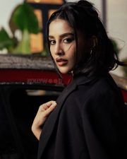 Stunning Nabha Natesh in a Dark Green Mini Dress with Long Boots Photos 08