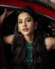Stunning Nabha Natesh in a Dark Green Mini Dress with Long Boots Photos 09