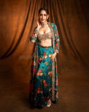 Stunning Pragya Jaiswal in a Traditional Floral Turquoise and Golden Lehenga Photos 02
