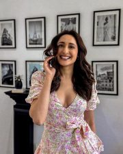 Stylish Pragya Jaiswal Cleavage in a Floral Mini Dress Photos 01