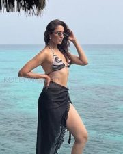 Stylish Pragya Jaiswal in a Black and White Triangle Style Bikini Top with a Sheer Sarong Wrap Pictures 03