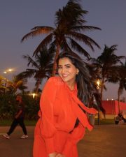 Stylish Rashi Singh in an Orange Button Down Shirt at Jeddah Waterfront in Saudi Arabia Photos 03