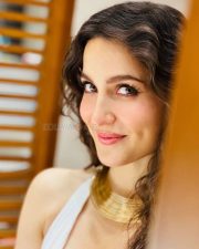 Swedish Greek Dancer Elli AvrRam in a White Halter Neck Top Pictures 02