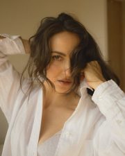 Swedish Model Elli AvrRam in a White Oversized Button Down Shirt Photos 03