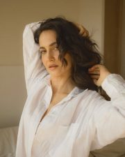 Swedish Model Elli AvrRam in a White Oversized Button Down Shirt Photos 04