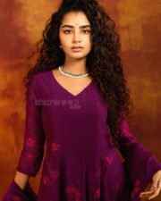 The Pet Detective Actress Anupama Parameswaran in a Purple Floor Length Anarkali Kurta with Floral Embroidery Photos 01