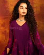 The Pet Detective Actress Anupama Parameswaran in a Purple Floor Length Anarkali Kurta with Floral Embroidery Photos 04
