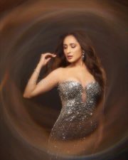 Tollywood Beauty Pragya Jaiswal in a Strapless Silver Sequined Gown Photos 02