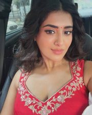 Vibrant Actress Rashi Singh in a Red Sleeveless Short Kurta with a Voluminous Red Lehenga Skirt Pictures 01