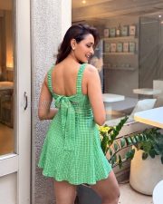 Vivacious Actress Pragya Jaiswal in a Green Check Sweetheart Mini Dress Photos 02