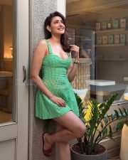 Vivacious Actress Pragya Jaiswal in a Green Check Sweetheart Mini Dress Photos 05