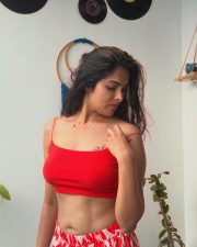 1000 Words Actress Divi Vadthya in a Red Ribbed Crop Top with a Red and White Printed Straight Cut Pants Pictures 01