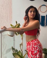 1000 Words Actress Divi Vadthya in a Red Ribbed Crop Top with a Red and White Printed Straight Cut Pants Pictures 02