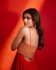 Aadya Actress Hebah Patel in a Red Anarkali Gown with an Embroidered Orange and Yellow Bodice Stills 07