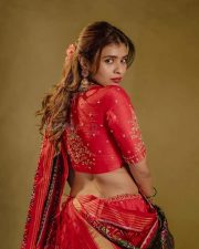 Aadya Heroine Hebah Patel in a Traditional Red and Green Half Saree with a Red Embroidered Blouse and Green Patola Dupatta Photos 01