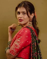 Aadya Heroine Hebah Patel in a Traditional Red and Green Half Saree with a Red Embroidered Blouse and Green Patola Dupatta Photos 02