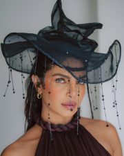 Actress Priyanka Chopra Jonas in a Cropped Silk Halter Neck Backless Top with a Mid Rise Waist Luna Draped Harem Pant Photos 01