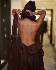 Actress Priyanka Chopra Jonas in a Cropped Silk Halter Neck Backless Top with a Mid Rise Waist Luna Draped Harem Pant Photos 03