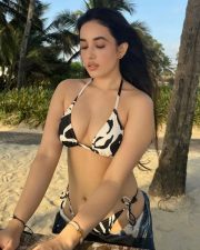 Alluring Aditi Budhathoki Cleavage in a Black White Animal Print Bikini Photos 02