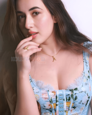 Alluring Aditi Budhathoki Cleavage in a Light Blue Floral Lace Corset Top Photos 03
