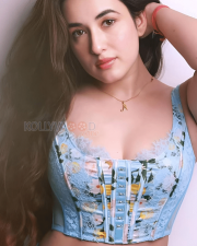 Alluring Aditi Budhathoki Cleavage in a Light Blue Floral Lace Corset Top Photos 04