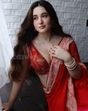 Alluring Aditi Budhathoki Cleavage in a Red Banarasi Saree Photos 05