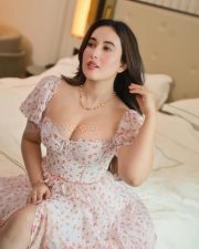 Alluring Aditi Budhathoki Cleavage in a White Floral Puff Sleeve Corset Dress Photos 05